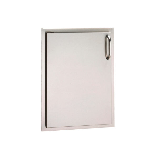 Stainless steel vertical access door with sleek handle, designed for outdoor kitchen storage and built-in island access.