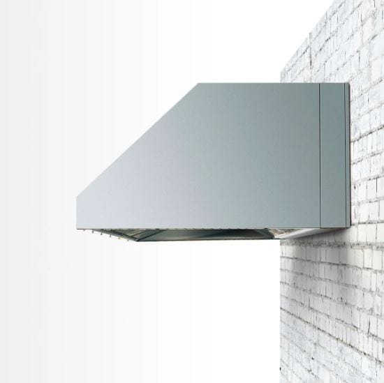 Modern stainless steel outdoor vent hood mounted on a brick wall, designed for efficient smoke and heat ventilation.