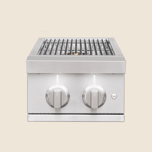 Stainless steel outdoor grill with two illuminated control knobs and cooking grates designed for precise heat control.