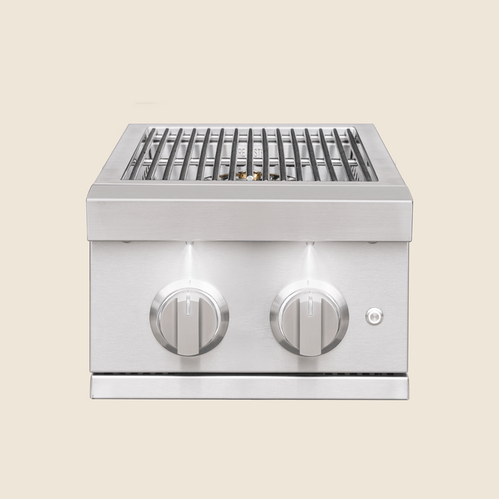 Stainless steel outdoor grill with two illuminated control knobs and cooking grates designed for precise heat control.