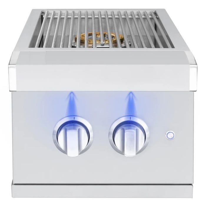 Stainless steel outdoor side burner with dual control knobs illuminated in blue, featuring a sleek grill grate and modern design.