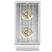 Top-down view of a stainless steel outdoor side burner with two brass burners beneath a sleek, durable grill grate.