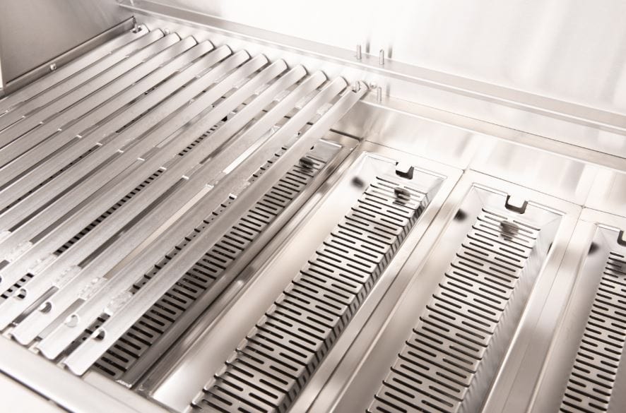 Close-up of stainless steel grill interior featuring heavy-duty cooking grates and perforated heat plates for even heat distribution.
