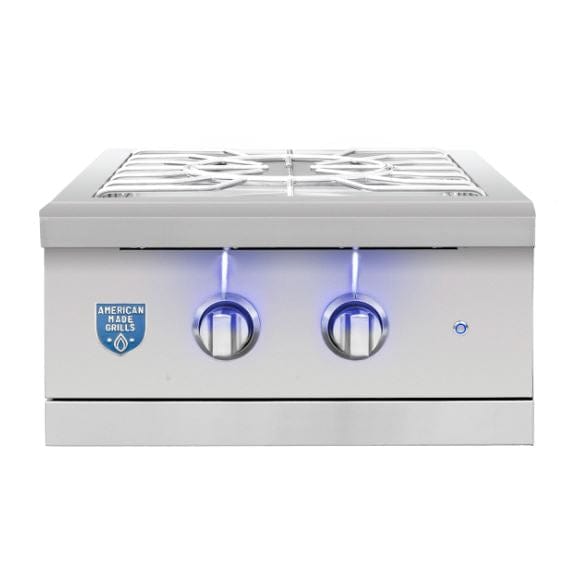 Stainless steel outdoor double burner with illuminated blue control knobs, sturdy cooking grates, and a sleek, modern design.