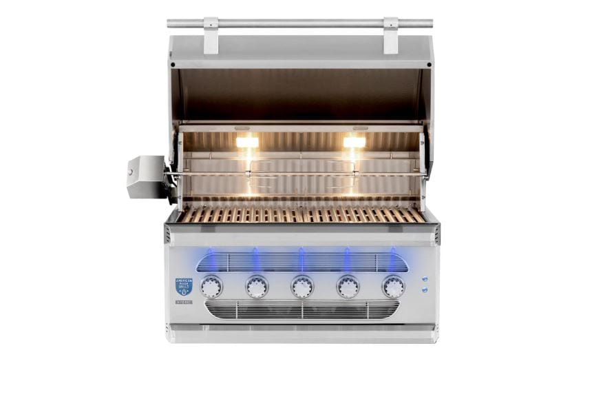 Open stainless steel grill with illuminated interior, cooking grates, warming rack, and five LED-lit control knobs for outdoor cooking.