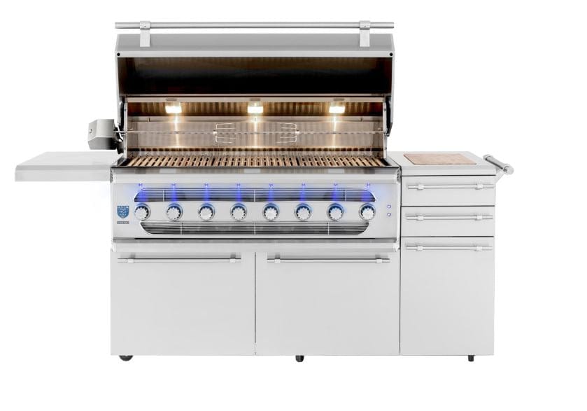 Large stainless steel grill with an open lid, illuminated cooking grates, warming rack, seven LED-lit knobs, side shelves, and storage drawers.