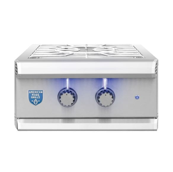 Stainless steel outdoor power burner with robust grates, blue LED-illuminated control knobs, and a sleek, durable design.
