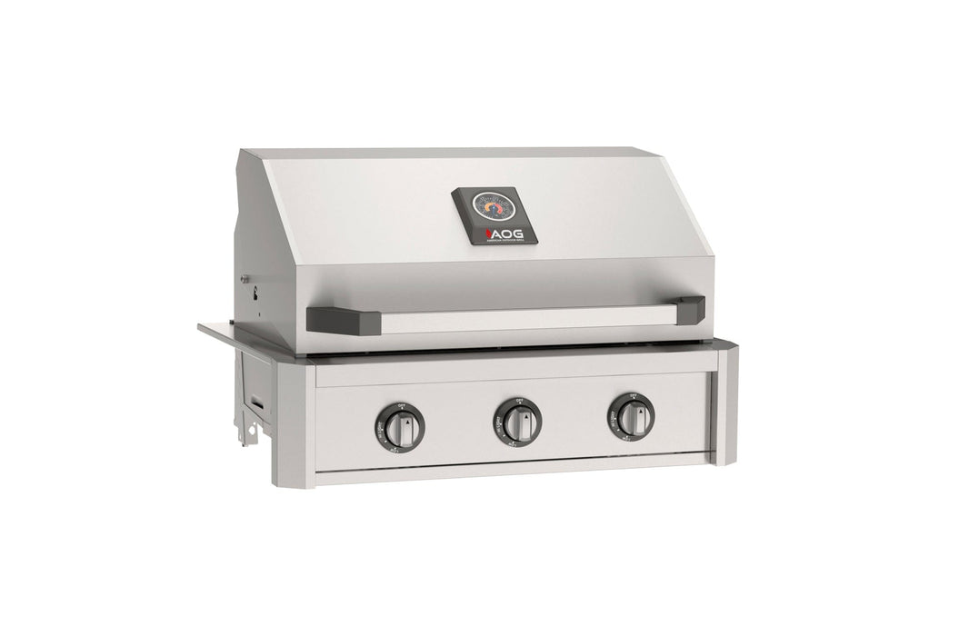 Stainless steel built-in gas grill with hood, analog temperature gauge, and three front control knobs for outdoor kitchen grilling.