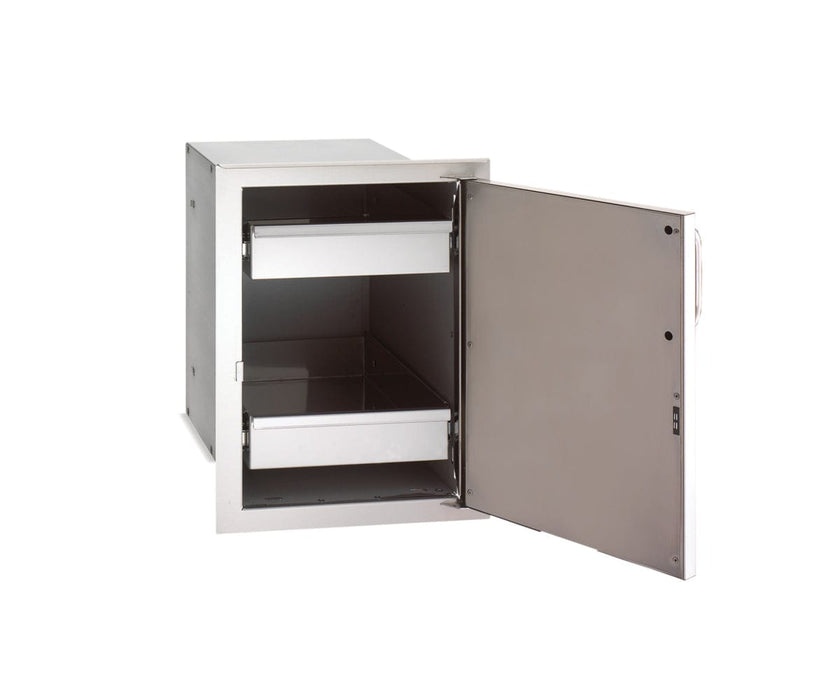 Stainless steel storage cabinet with right-hinged door open, revealing two interior pull-out drawers for outdoor kitchen organization.