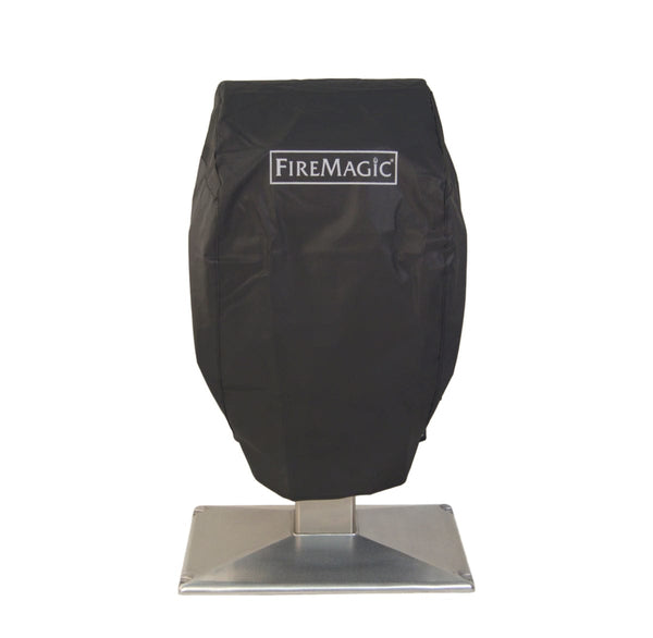 Black protective cover placed over a stainless steel pedestal grill, designed to shield it from outdoor elements and weather damage.