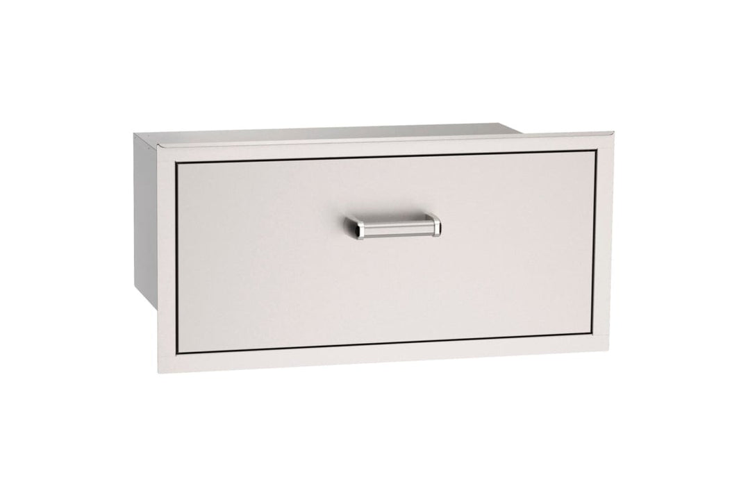 Stainless steel storage drawer with sleek handle design, offering ample space for organizing outdoor kitchen tools and accessories.