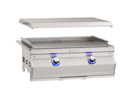 Stainless steel outdoor flat top gas griddle with lift-off lid and blue LED-lit control knobs for versatile cooking performance.