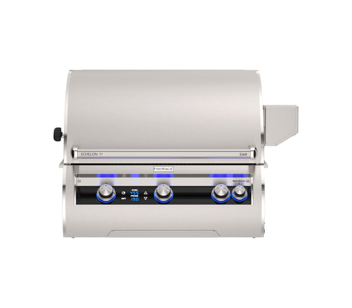 Sleek built-in stainless steel gas grill with curved lid, digital display, and blue LED-lit knobs for precision temperature control.