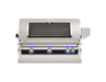 Built-in stainless steel gas grill with glass viewing window, analog thermometer, and blue LED-lit knobs for precise outdoor grilling.