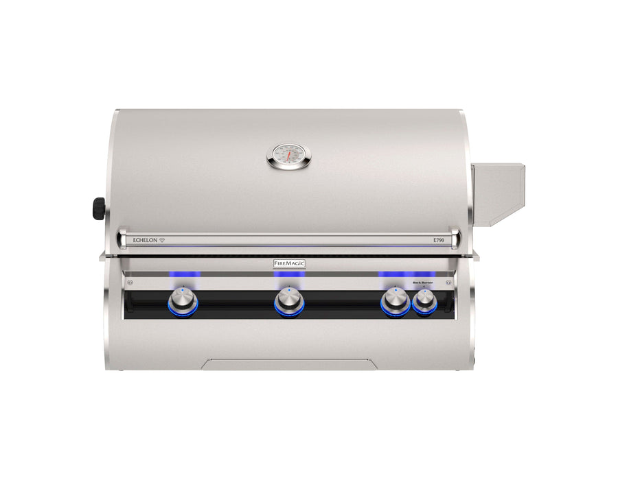 Premium built-in stainless steel gas grill with curved lid, analog thermometer, and blue LED-lit knobs for luxury outdoor grilling experience.