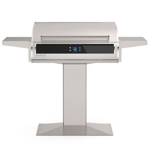 Sleek pedestal-style stainless steel grill with digital touch controls, dual side shelves, and a modern hood for outdoor cooking.