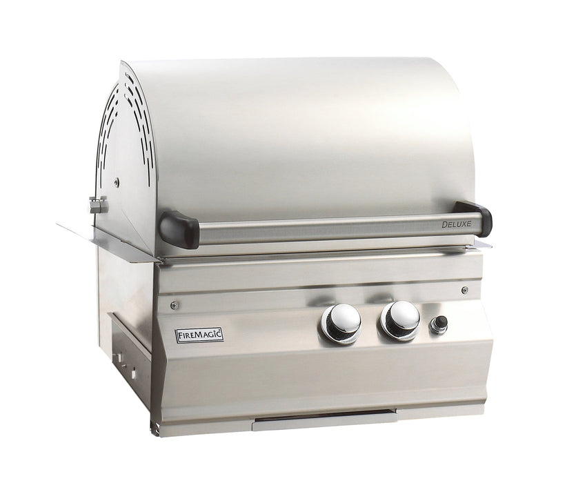 Stainless steel outdoor gas grill with dual control knobs, domed lid, and compact built-in design for backyard cooking.