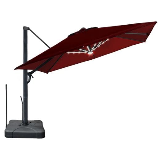 Cantilever patio umbrella with a burgundy canopy, solar-powered LED lights, sturdy base, and adjustable arm for versatile outdoor shading.