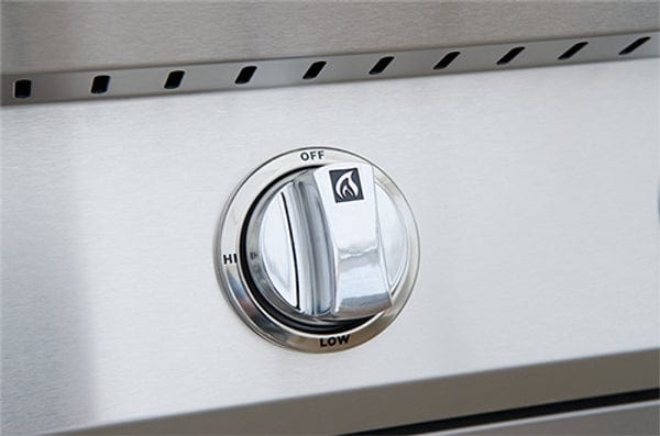 Close-up of a stainless steel control knob with high, low, and off settings, designed for precise heat adjustment on a gas grill