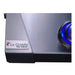 Close-up of stainless steel griddle surface with blue illuminated control knob and brushed metal construction.
