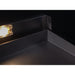 Close-up of stainless steel flat-top griddle cooking surface with raised backsplash and integrated cooking light.