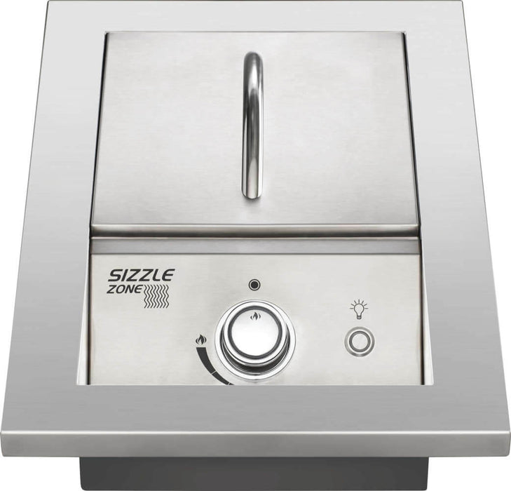 Stainless steel outdoor burner with protective lid, ergonomic control knob, ignition button, and built-in design for custom kitchens.