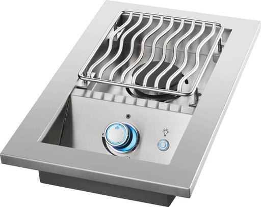 Stainless steel built-in single burner with wavy grill grates, blue-lit control knob, and push-button ignition, for outdoor cooking.