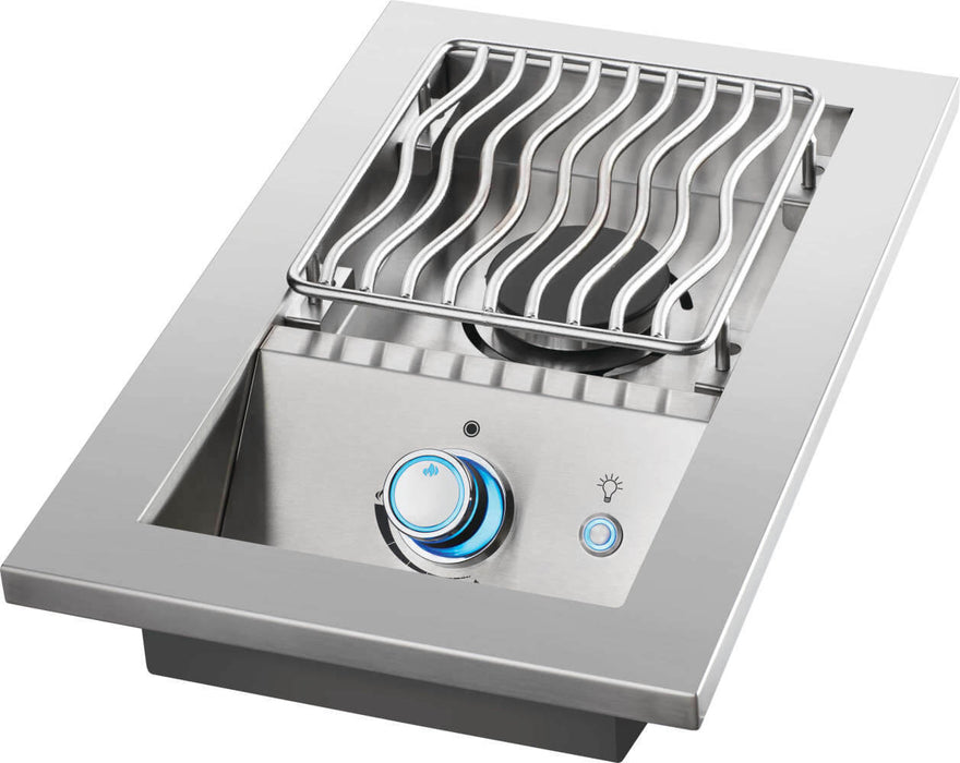 Stainless steel built-in single burner with wavy grill grates, blue-lit control knob, and push-button ignition, for outdoor cooking.