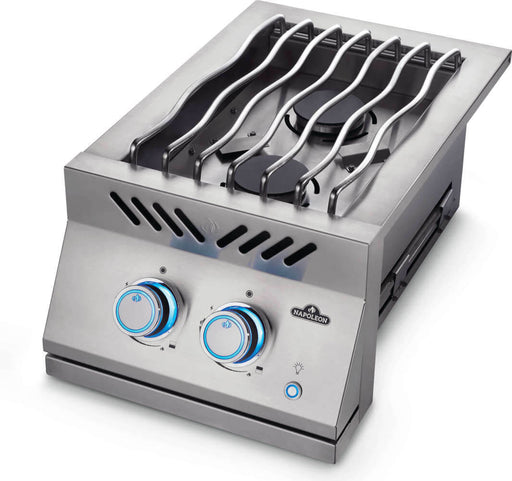 Stainless steel double burner with wavy grill grates, blue-lit control knobs, and a push-button ignition, designed for outdoor use.