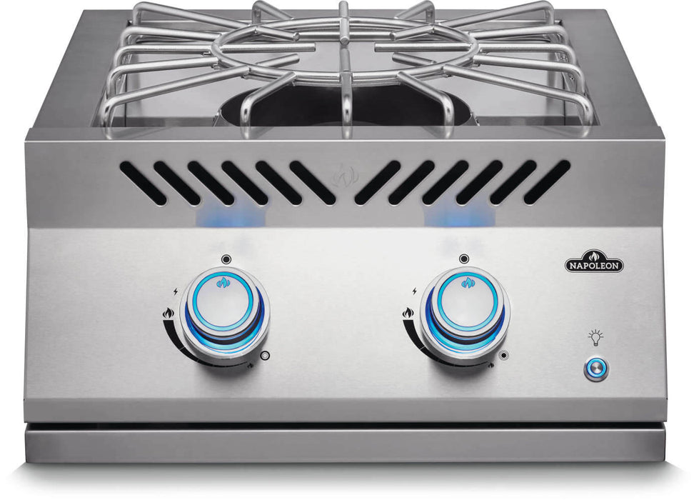 Stainless steel double burner with sturdy pot supports, blue-lit control knobs, and side vents, designed for outdoor cooking.