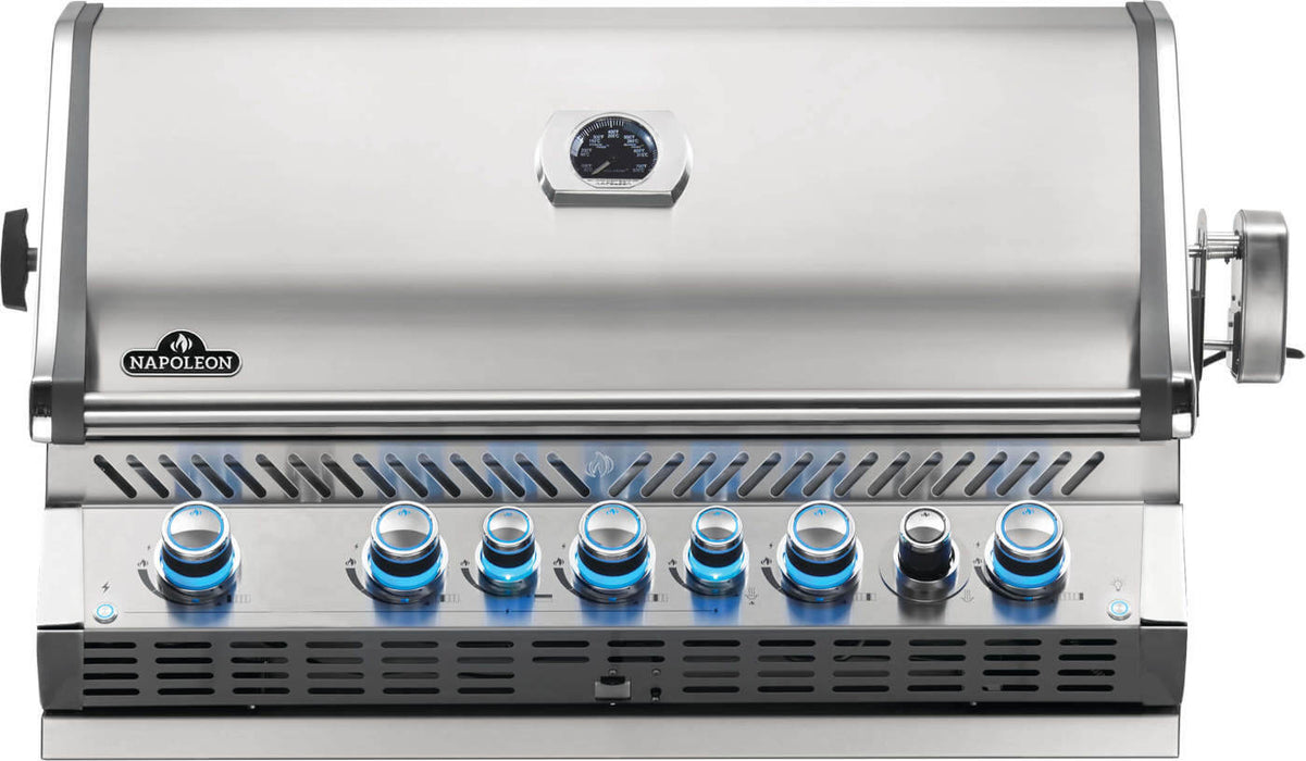 Stainless steel built-in gas grill with a closed lid, thermometer, blue-lit control knobs, vented design, and multiple burners.