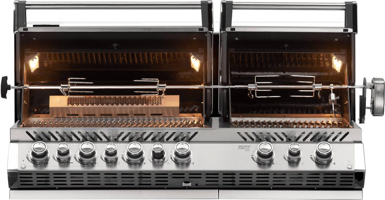 Dual-lid stainless steel built-in gas grill with open lids, interior lighting, rotisserie system, and multiple control knobs for versatile cooking.