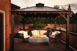 Cozy outdoor seating area under a gazebo with string lights, featuring a modern fire table surrounded by cushioned chairs on a deck.