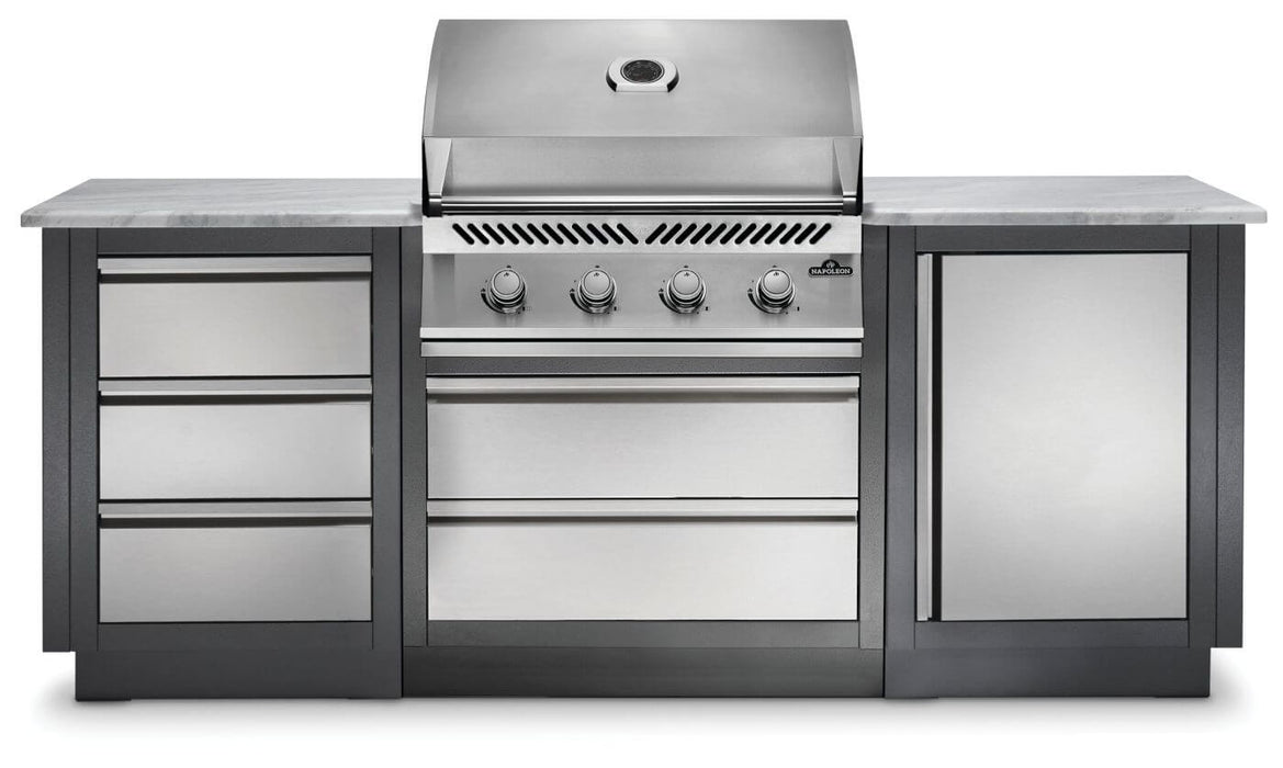 Built-in stainless steel gas grill with a closed lid, flanked by storage drawers and cabinets, featuring a sleek outdoor kitchen setup.