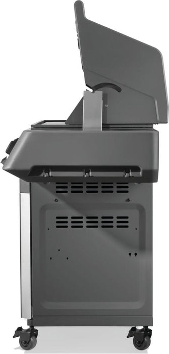 Side view of a freestanding grill with the lid partially open, showcasing ventilation slots and caster wheels for mobility.