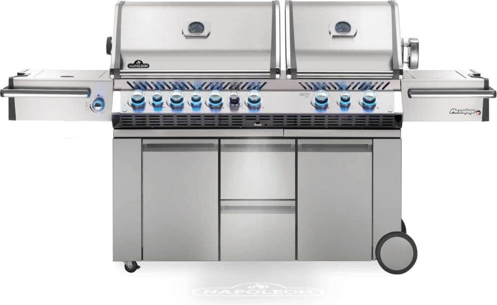 Large stainless steel outdoor grill with two separate lids, multiple burners with blue-lit control knobs, side burners, and storage cabinets