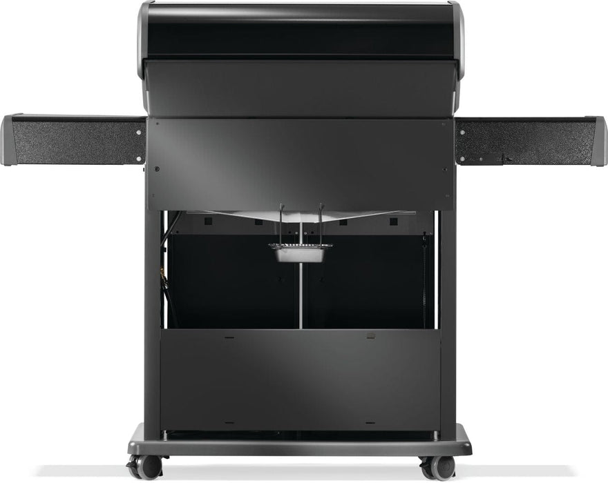 Back view of a black grill with a closed lid, foldable side shelves, and an open storage compartment with visible wheels for mobility.