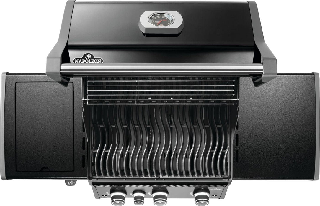 Top-down view of a closed grill lid with a temperature gauge, wavy cooking grates inside, and side panels on both sides of the grill.