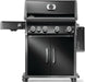 Black grill with four control knobs, double cabinet doors, side burner on the left, and utensil hooks on the right side panel.