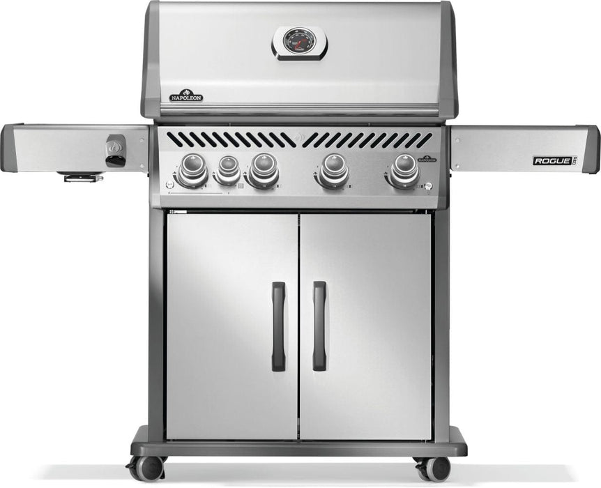 Front view of a stainless steel grill with four control knobs, double-door cabinet storage, side shelves, and caster wheels.