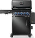 Black freestanding grill with five glowing control knobs, closed storage cabinet, side burner attachment, and foldable side shelves.