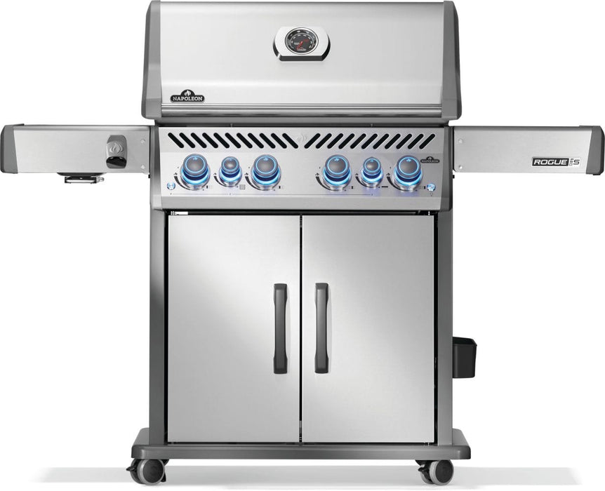 Stainless steel grill with illuminated control knobs, dual doors at the base, and foldable side shelves on a wheeled base.