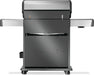 Back view of a stainless steel barbecue grill with a sleek design, storage compartments, and side shelves on caster wheels.