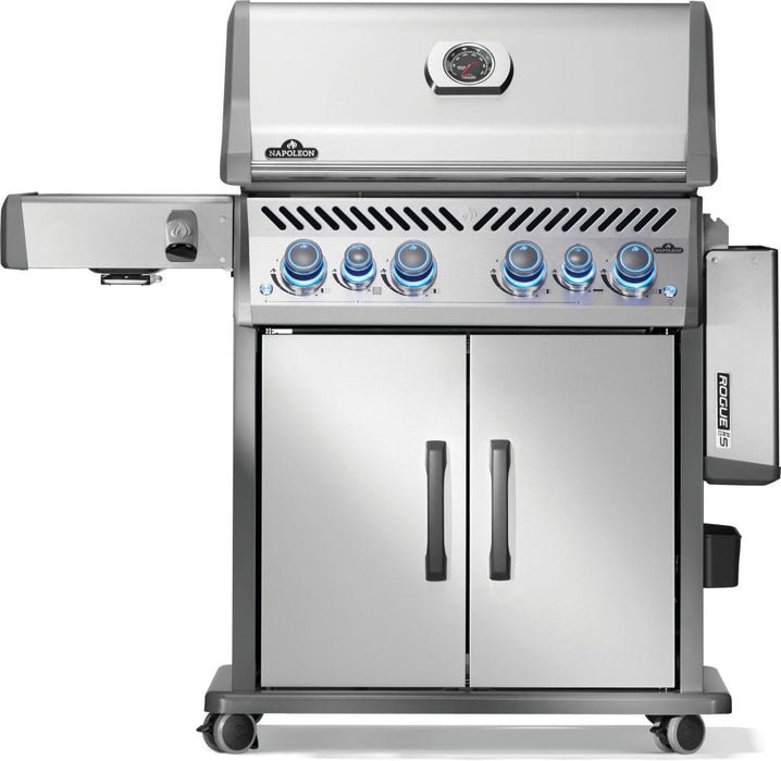 Front view of a stainless steel barbecue grill with illuminated control knobs, dual-door storage cabinet, and side burner attachment.