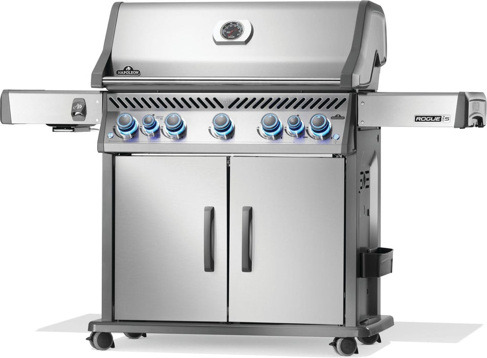 Stainless steel grill with double-door storage, blue-lit control knobs, side burners, and a built-in temperature gauge on the lid.