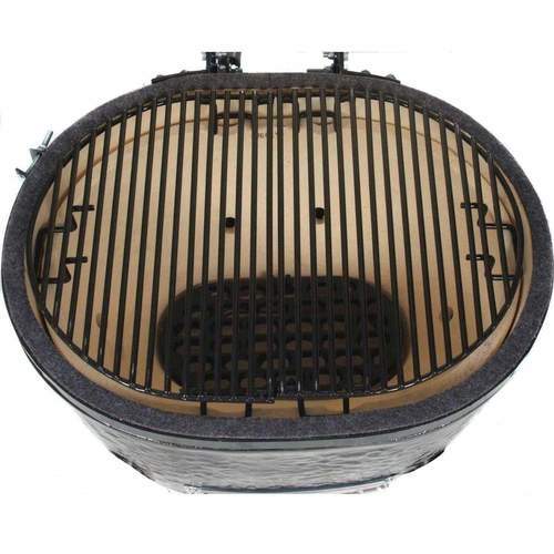 Top view of a black ceramic charcoal grill showing the oval cooking grates, central vented charcoal basket, and heat-resistant interior lining