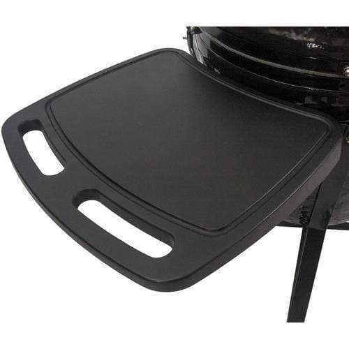 Close-up of a black fold-down side table attached to a grill, featuring a smooth surface with built-in handles for easy use and portability