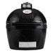 A black ceramic charcoal grill with a closed lid, built-in temperature gauge, and stainless steel vent panel at the base