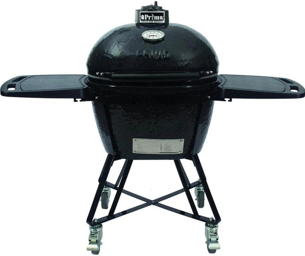 A black ceramic charcoal grill with foldable side tables, a cradle stand with locking casters, and a built-in temperature gauge