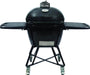 A black ceramic charcoal grill with foldable side tables, a cradle stand with locking casters, and a built-in temperature gauge